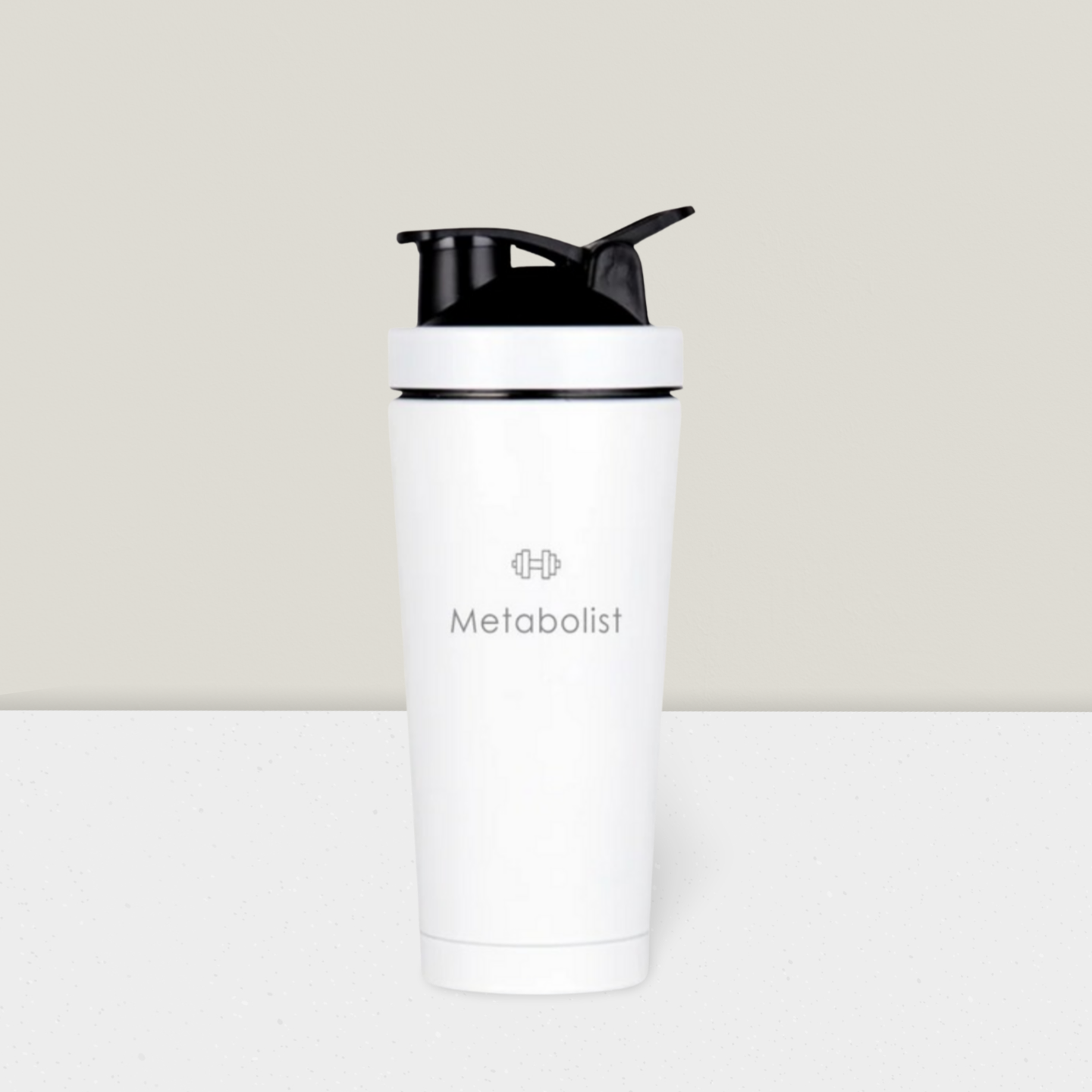White shaker bottle with black cap on a light gray background